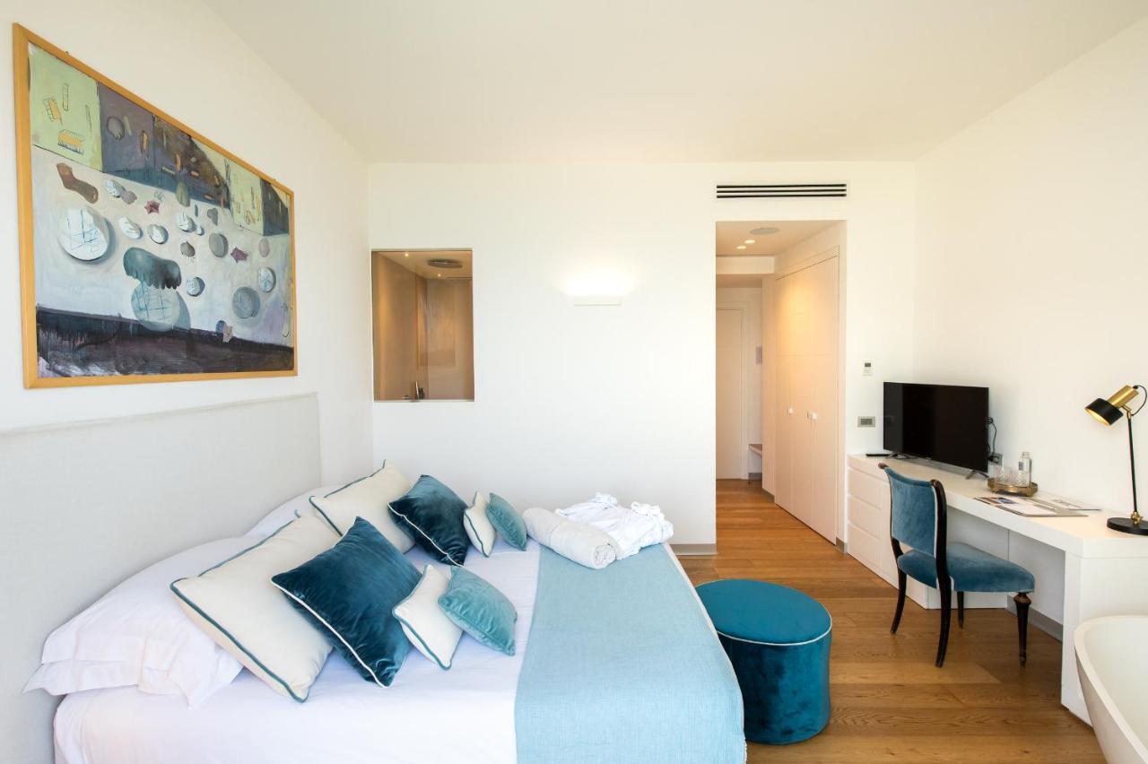 Unico Boutique Hotel D'Arte Монделло Екстер'єр фото