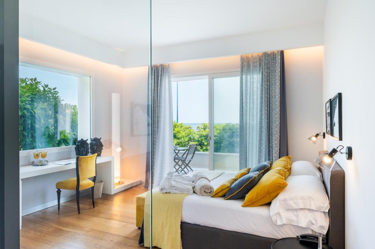 Unico Boutique Hotel D'Arte Монделло Екстер'єр фото