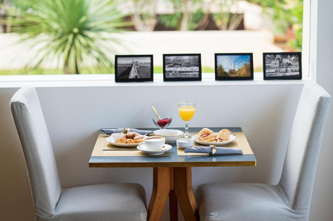 Unico Boutique Hotel D'Arte Монделло Екстер'єр фото